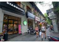 Thế Giới Di Động, Starbucks, Trung Nguyên... xin giảm giá mặt bằng